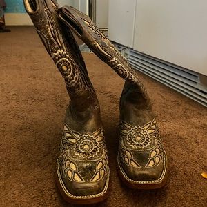 Woman’s brown square toe cowboy boots